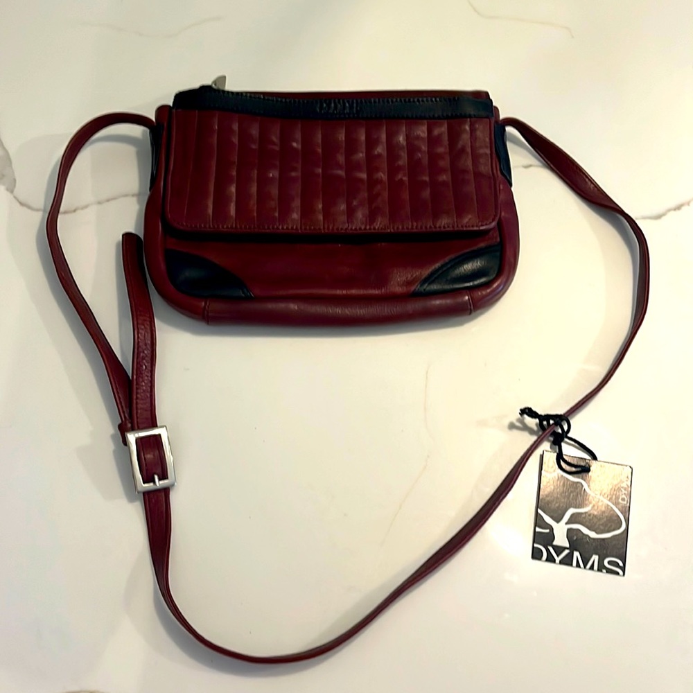 NWT Joanel Canada genuine leather crossbody bag 6 zip pockets, 1 flap inside